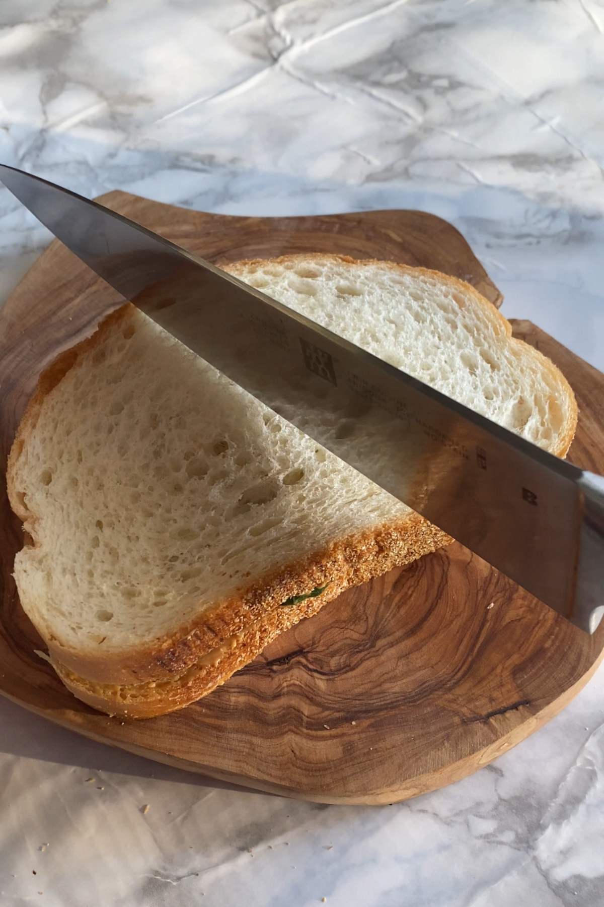Slicing sandwich in half.