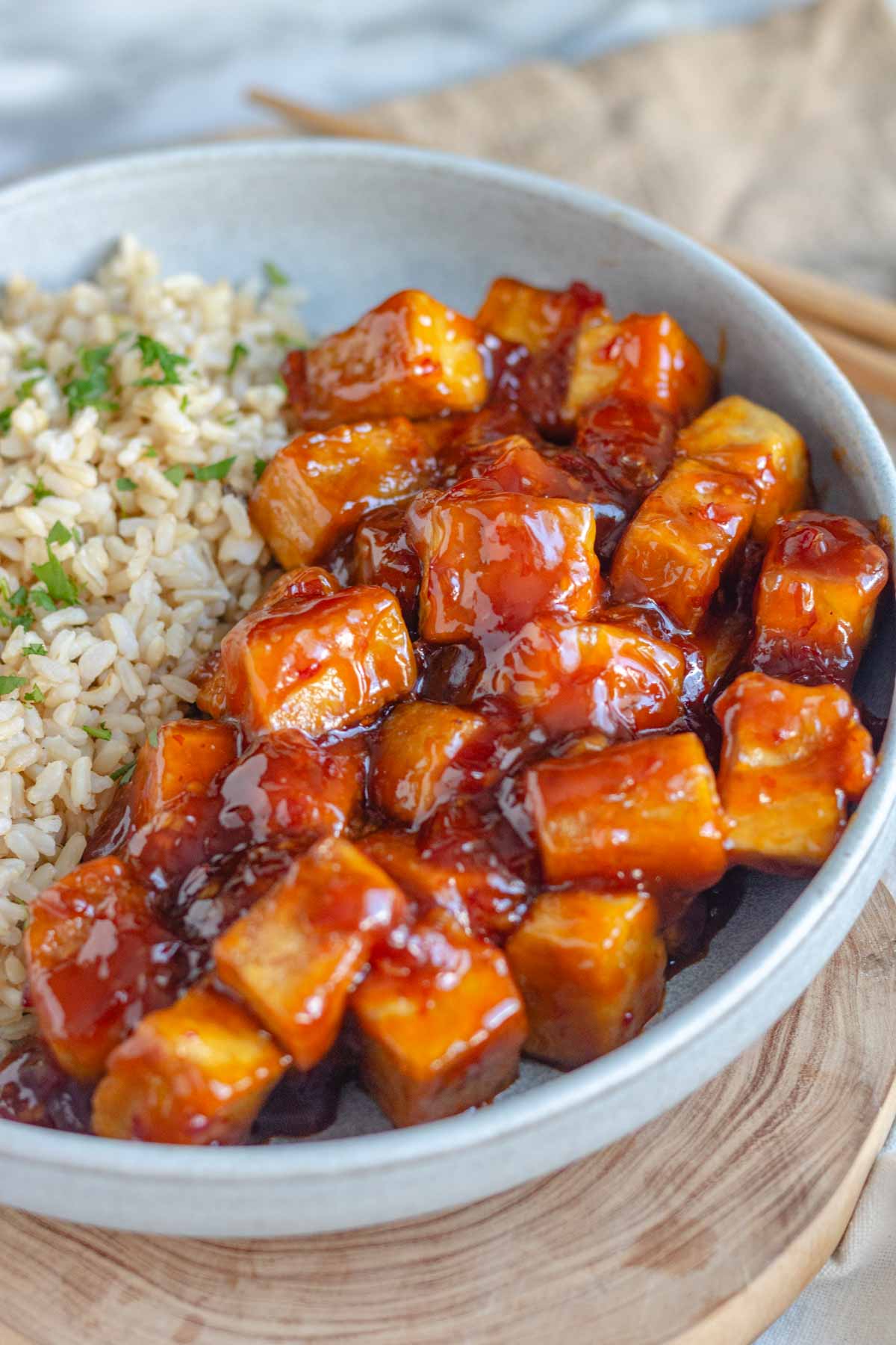 Sweet chili tofu and rice in a bowl.