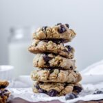 Vegan oatmeal chocolate chip cookies stacked.